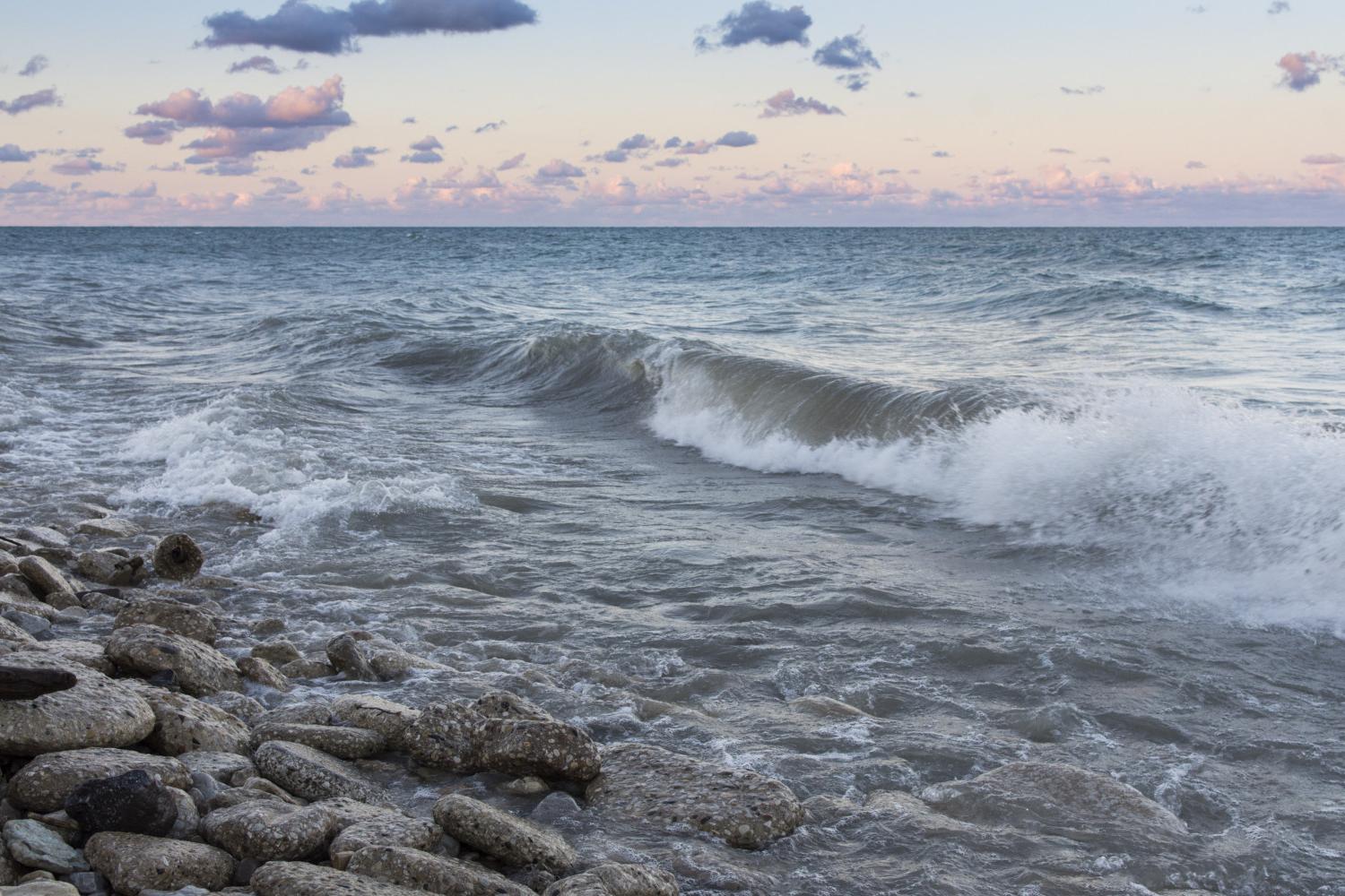 The sun rises over Lake Michigan on the <a href='http://3l8u.technestng.com'>博彩网址大全</a> campus.